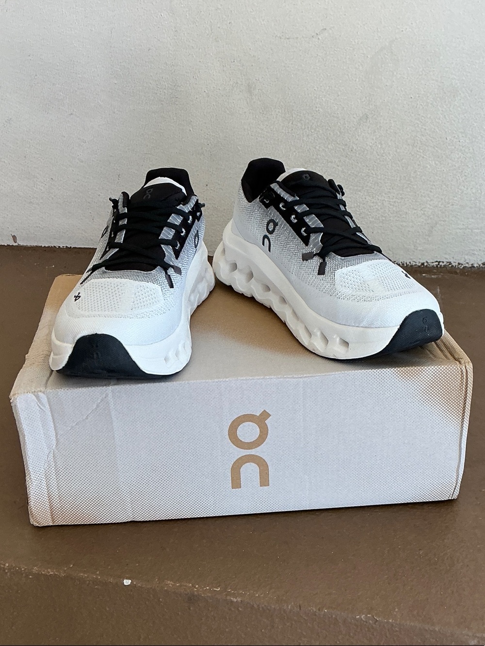 On cloud sneakers brand new. Black and white.
